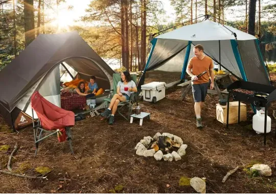 A family camping in the woods.