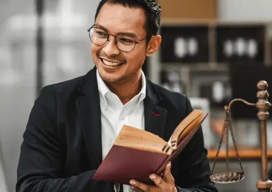 A lawyer reading a book.