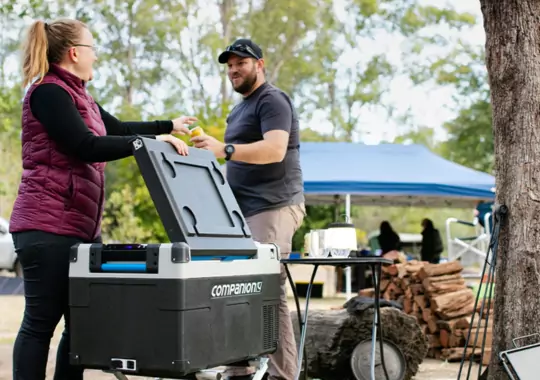 A woman with an Electric Cooler.