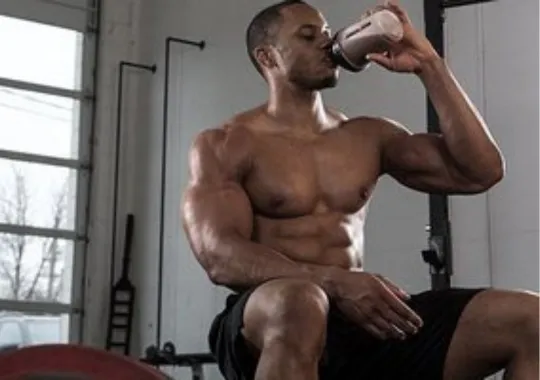 A man taking pre-workout products.